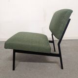 Modernist driver of the 50s/60s and her ottoman