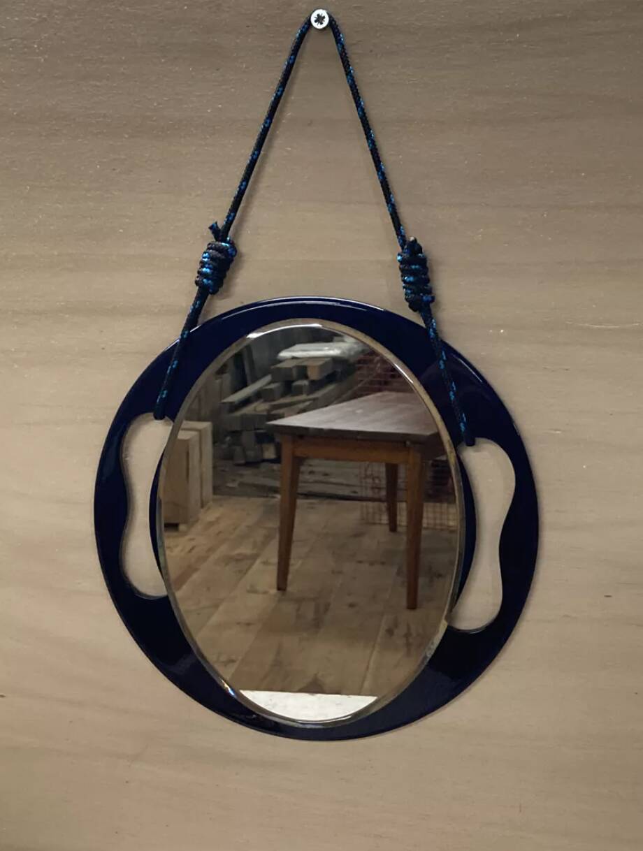 Small round wall mirror in dark blue bakelite 1960