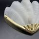 Shell wall light in gilded brass and frosted pressed glass Art Deco style