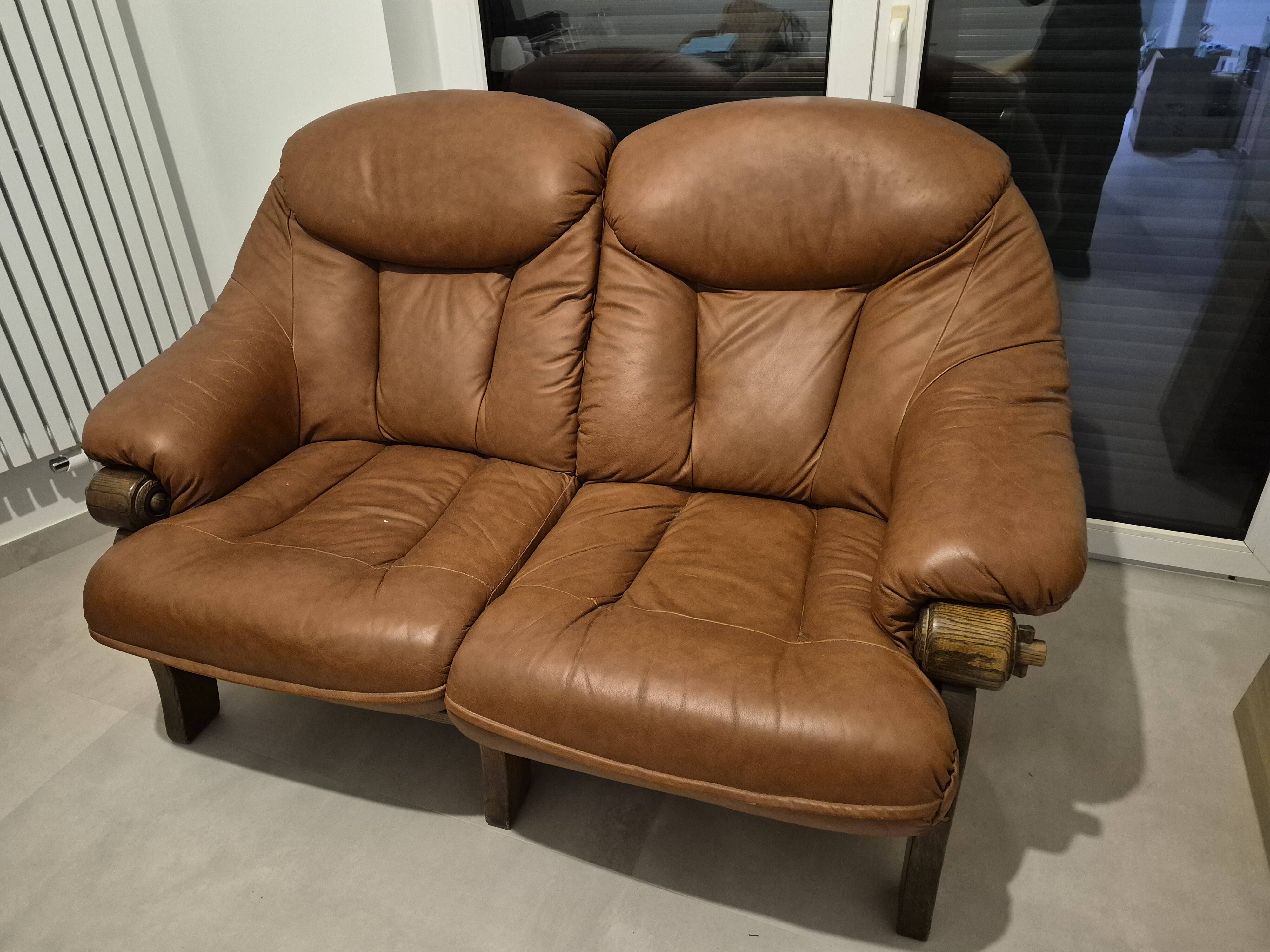 Vintage Scandinavian two-seater sofa in cognac leather and solid oak.