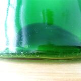 Old blown glass bottle, free form. Armagnac