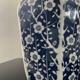 Vintage porcelain vase with white and blue decor