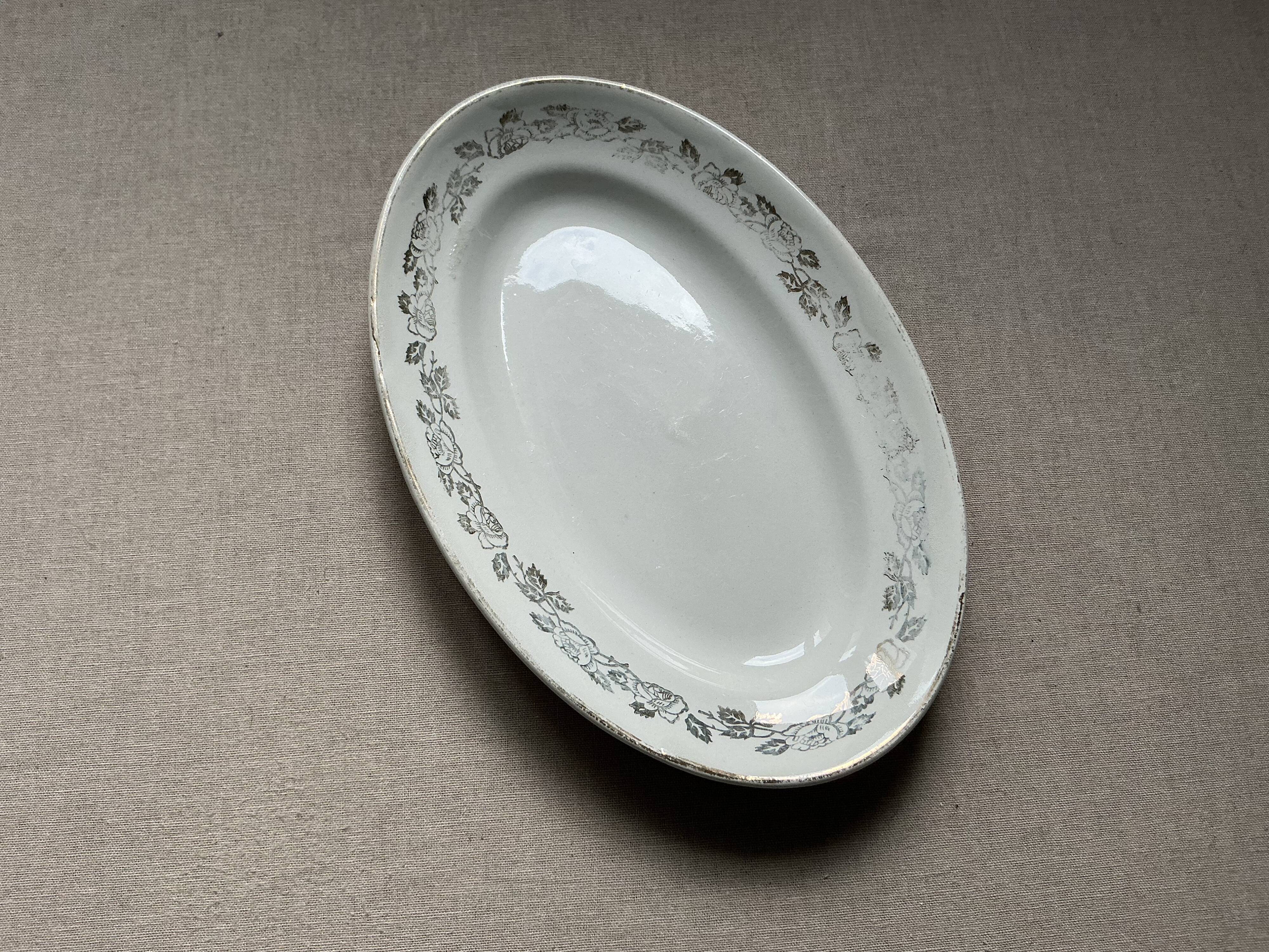 Antique oval plate Moulin des Loups Orchies – grey and gold floral decoration