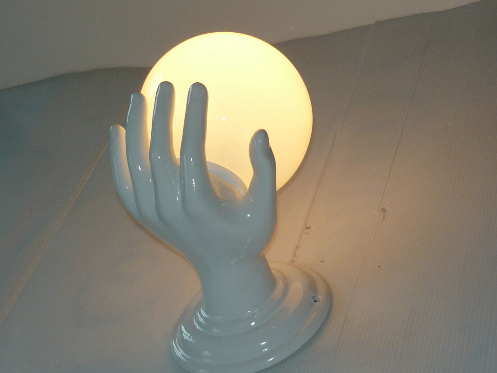 White ceramic hand wall light and white opaline globe, in perfect condition