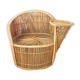 Fauteuil vintage à tablette en osier