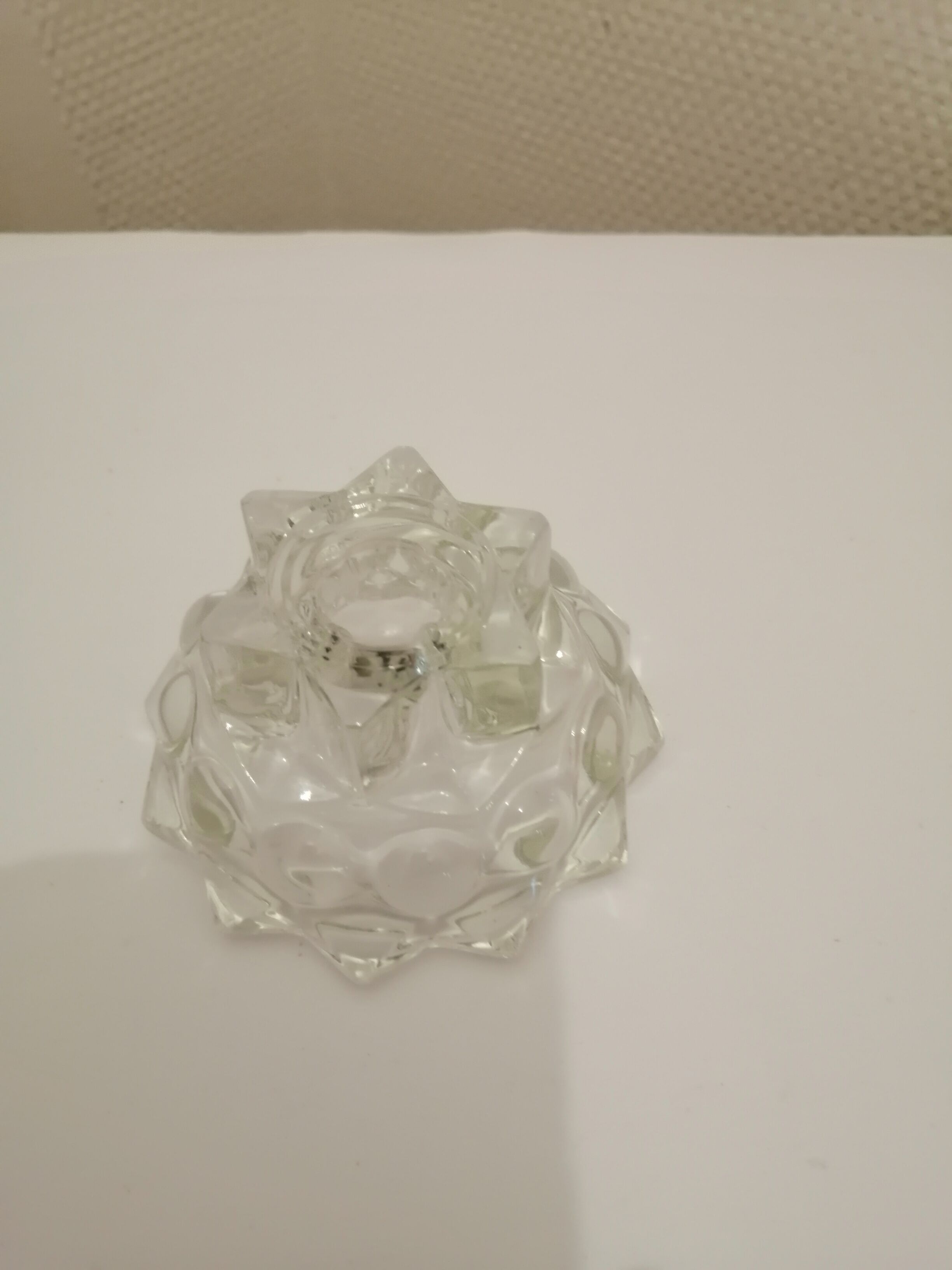 Metal base glass candle holder