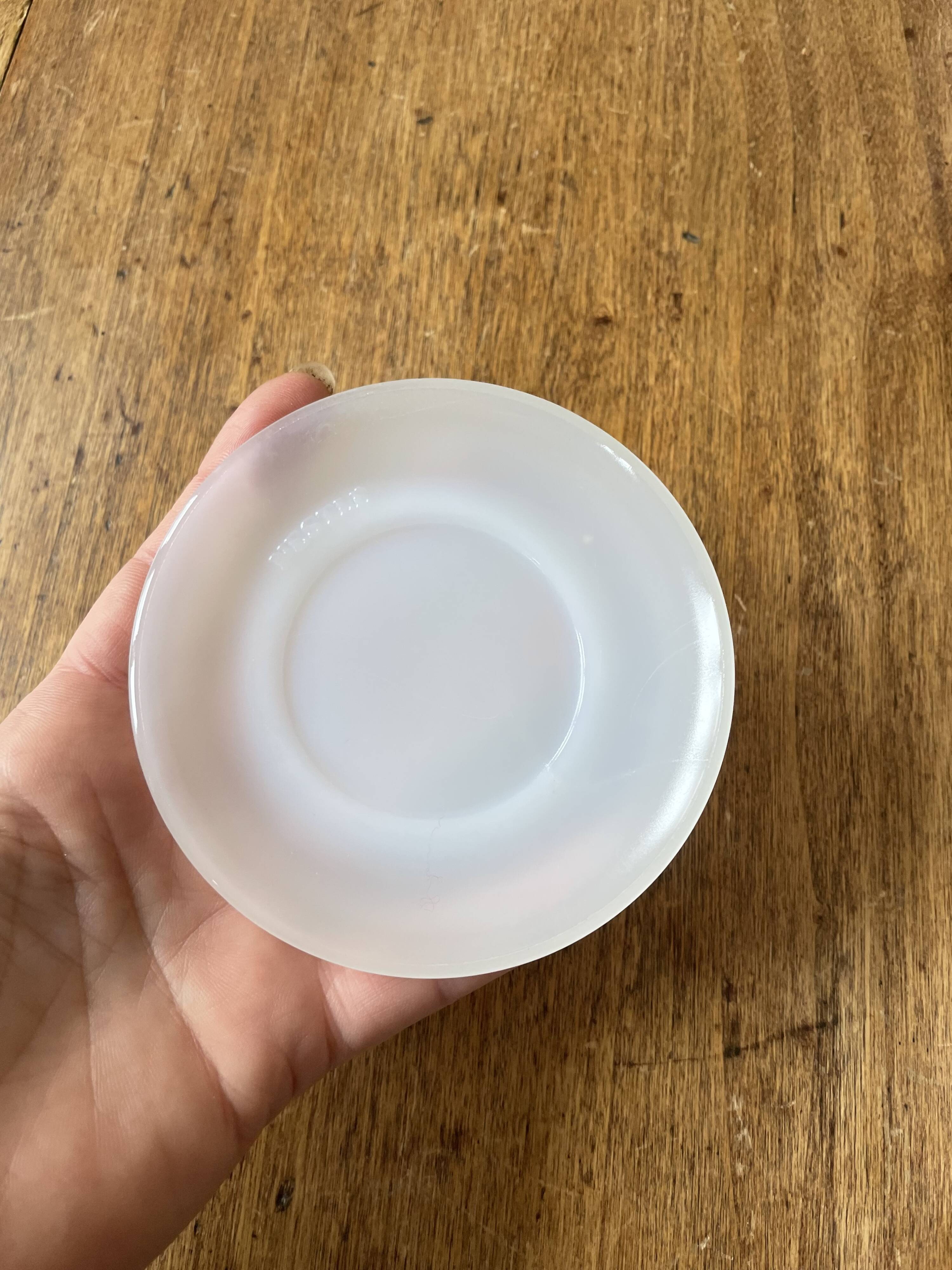 Espresso coffee cup service, Nestlé promotional items, in white glass.