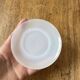 Espresso coffee cup service, Nestlé promotional items, in white glass.