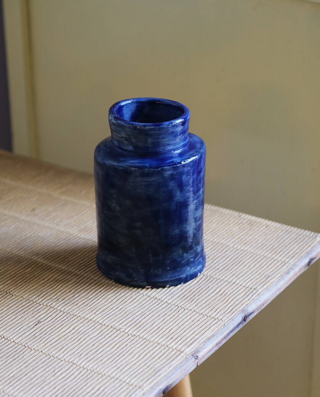 Blue glazed clay vase, handmade, unique piece.