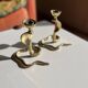Pair of vintage brass snake candlesticks