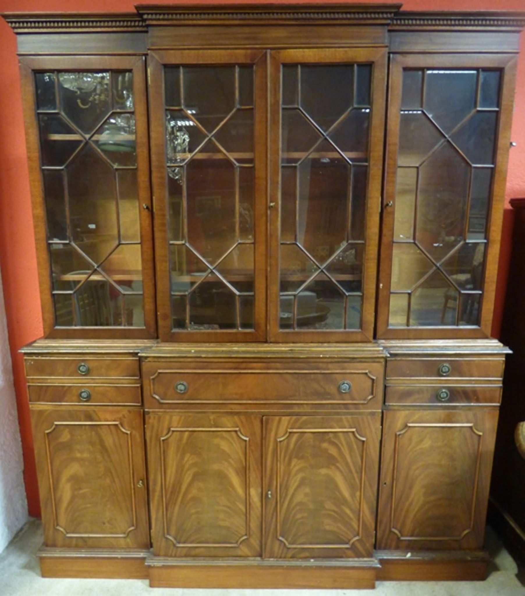 Scribanne bookcase in mahogany veneer English work of the twentieth century