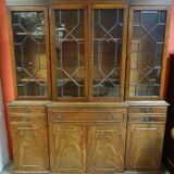 Scribanne bookcase in mahogany veneer English work of the twentieth century