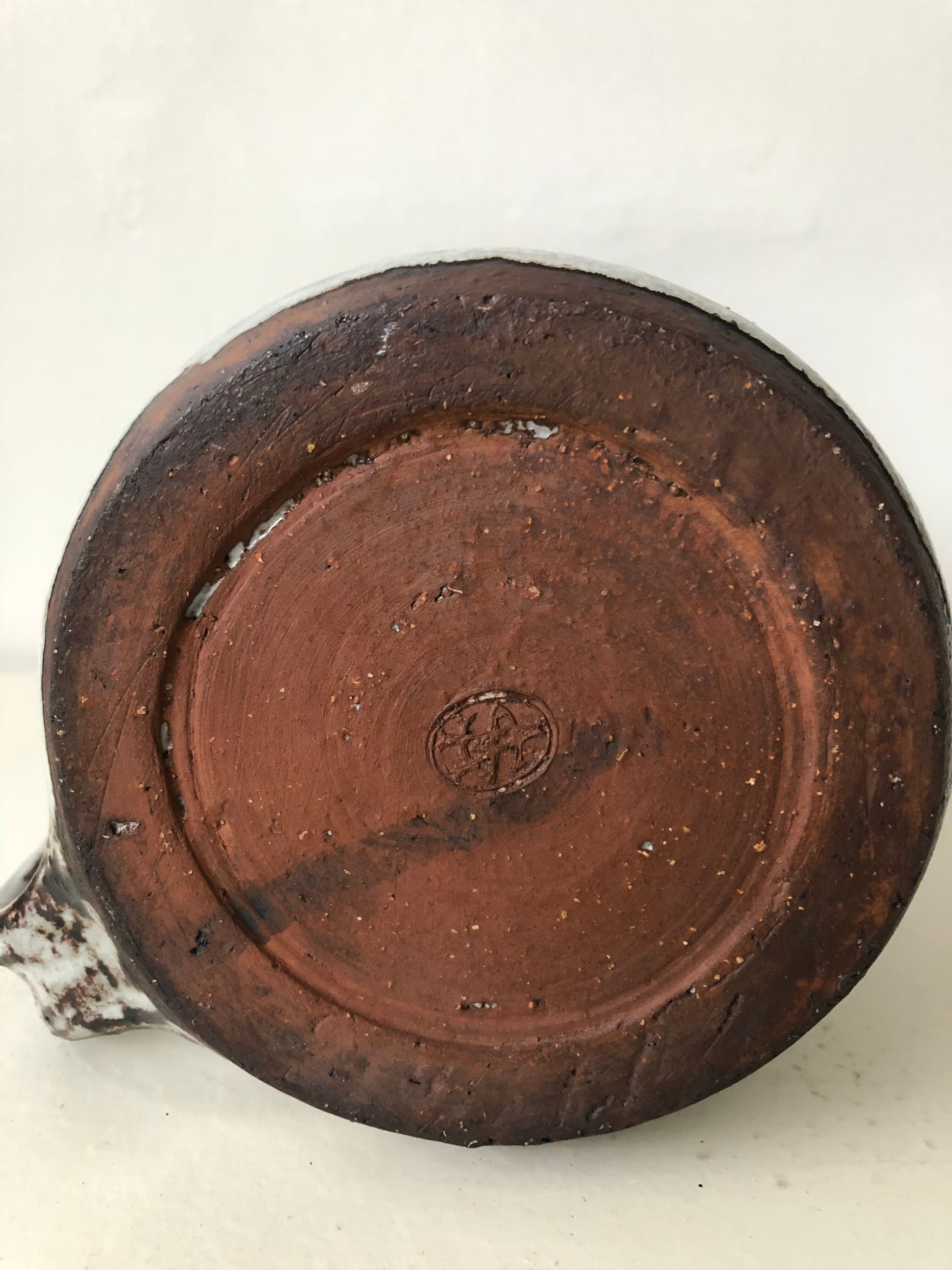 Brown grey enamelled stoneware pitcher