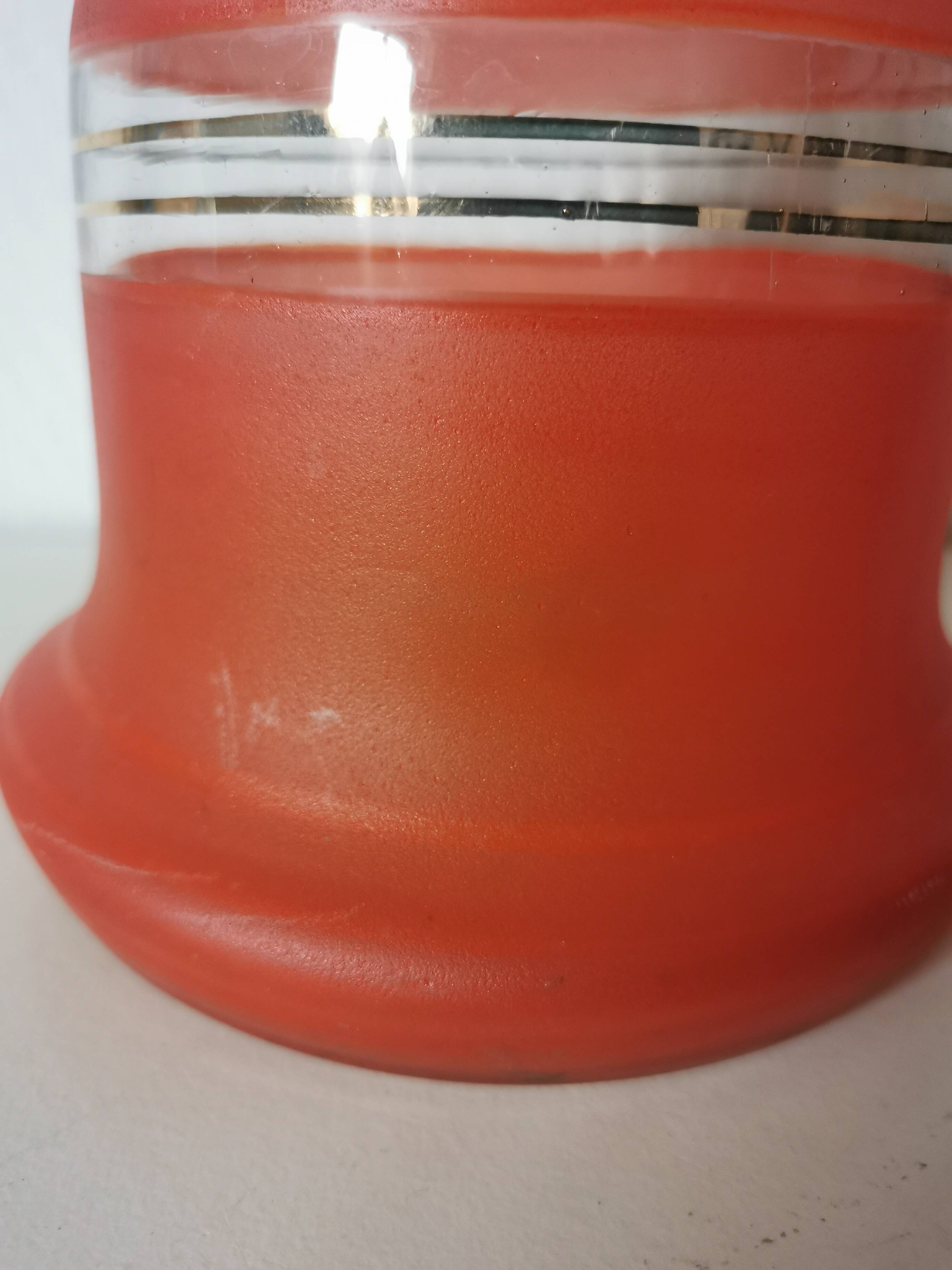 painted glass vase, red and gold granite appearance