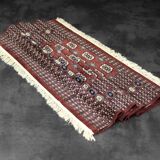Handwoven red Boukhara oriental rug, 1960s