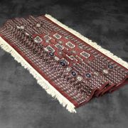 Handwoven red Boukhara oriental rug, 1960s
