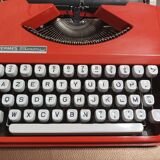 Hermes baby orange typewriter