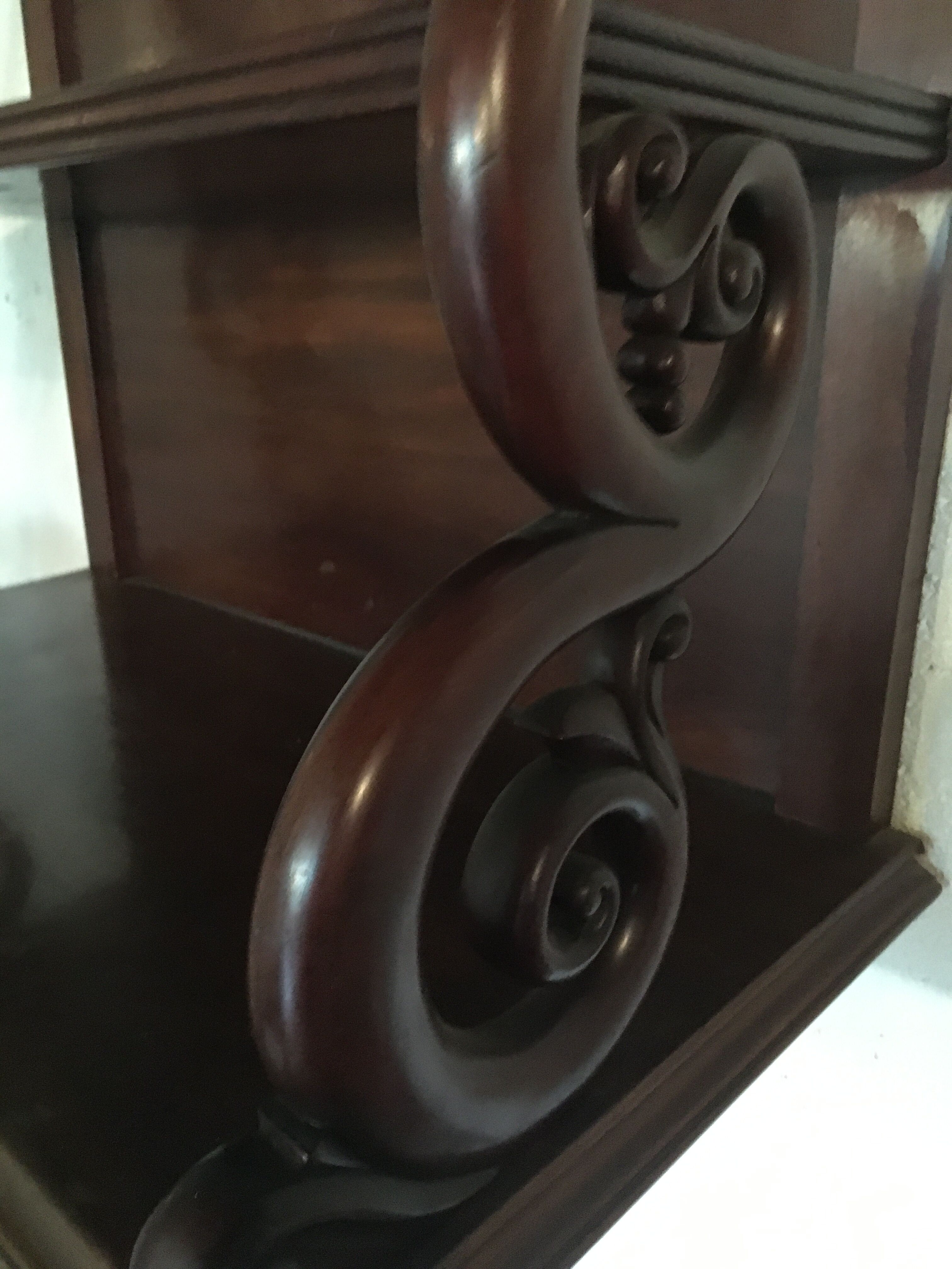 Carved wooden wall shelf.