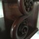 Carved wooden wall shelf.