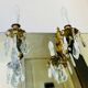St Louis XV wall lights in gilded bronze with pendants from the mid-20th century.