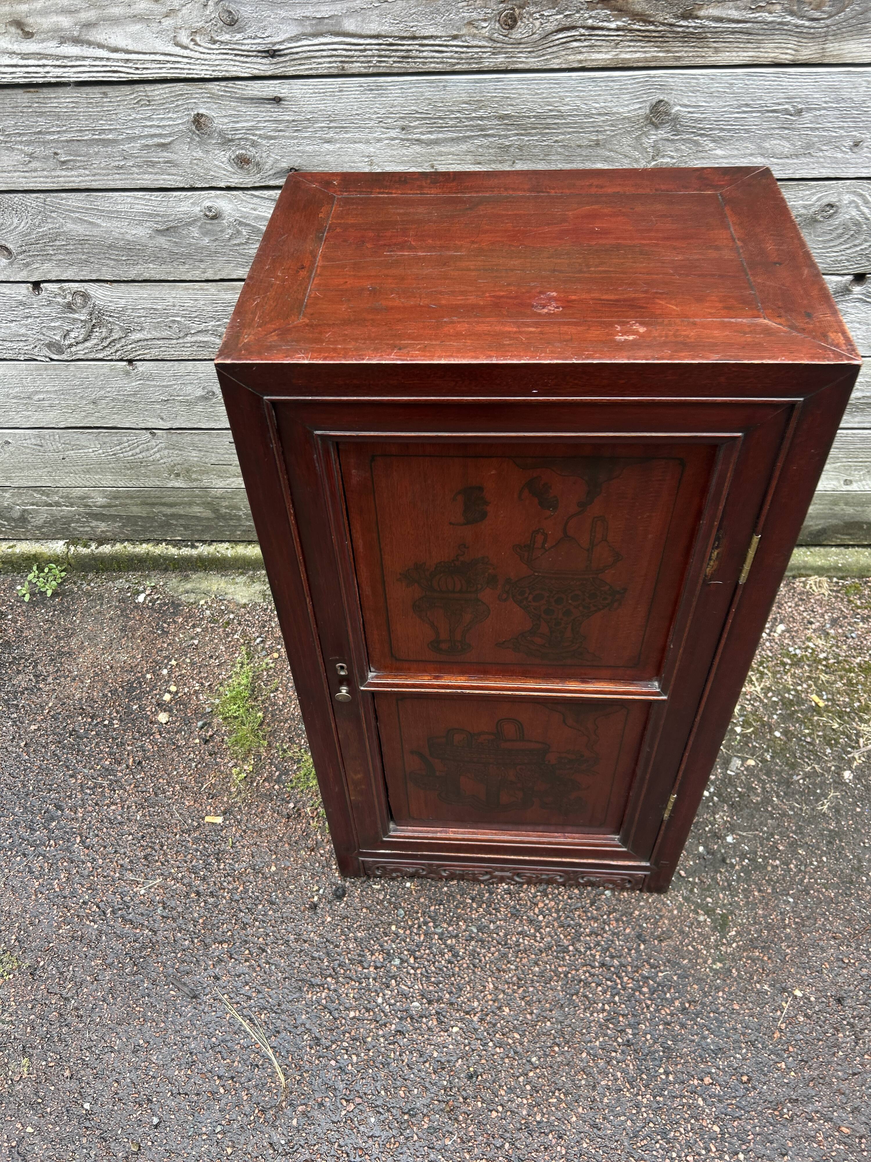 Small cabinet with one door, Indonesian.