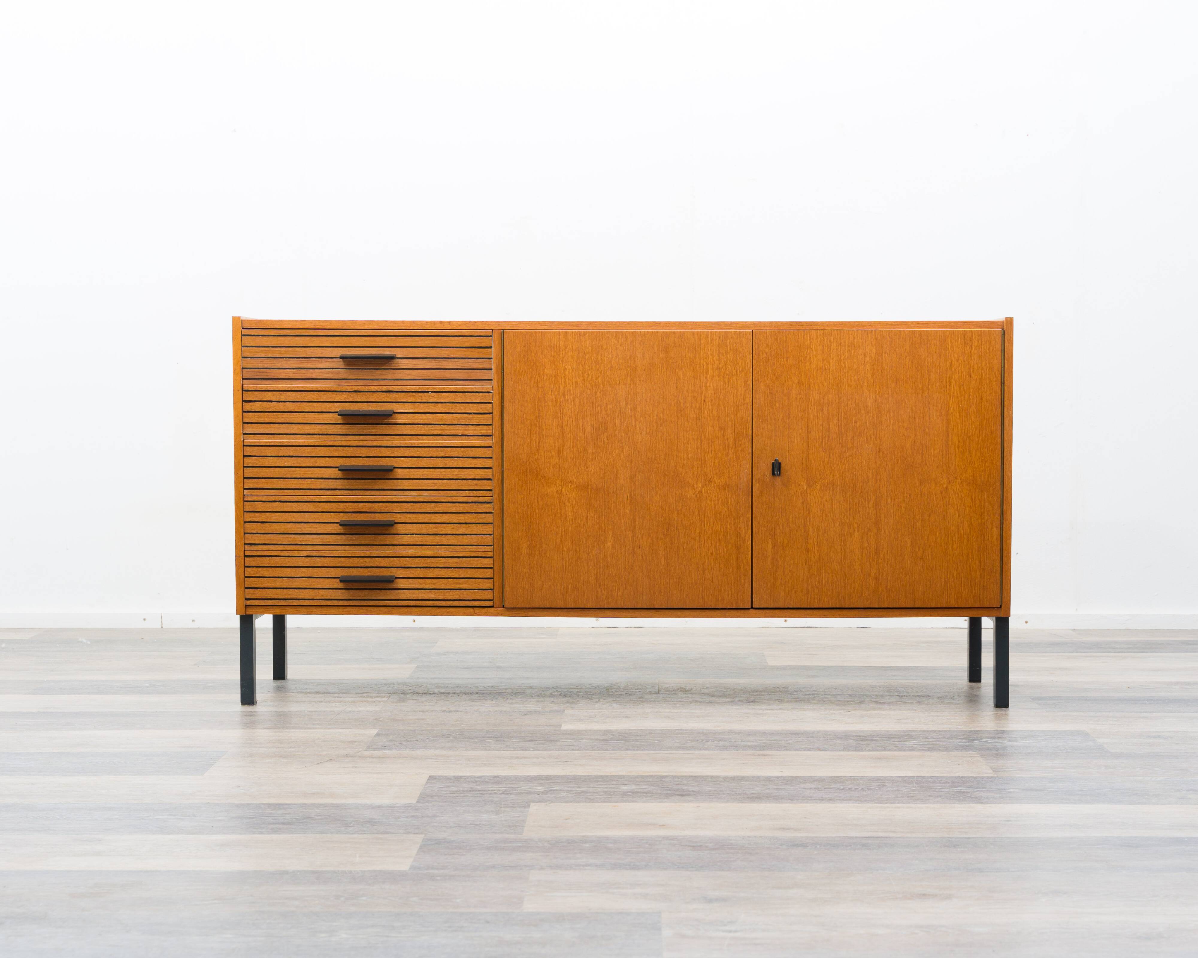 Teak sideboard with grooved drawers, 1960s.