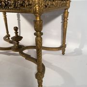 Middle wooden table with green-golden patina Louis XVI style, nineteenth century.