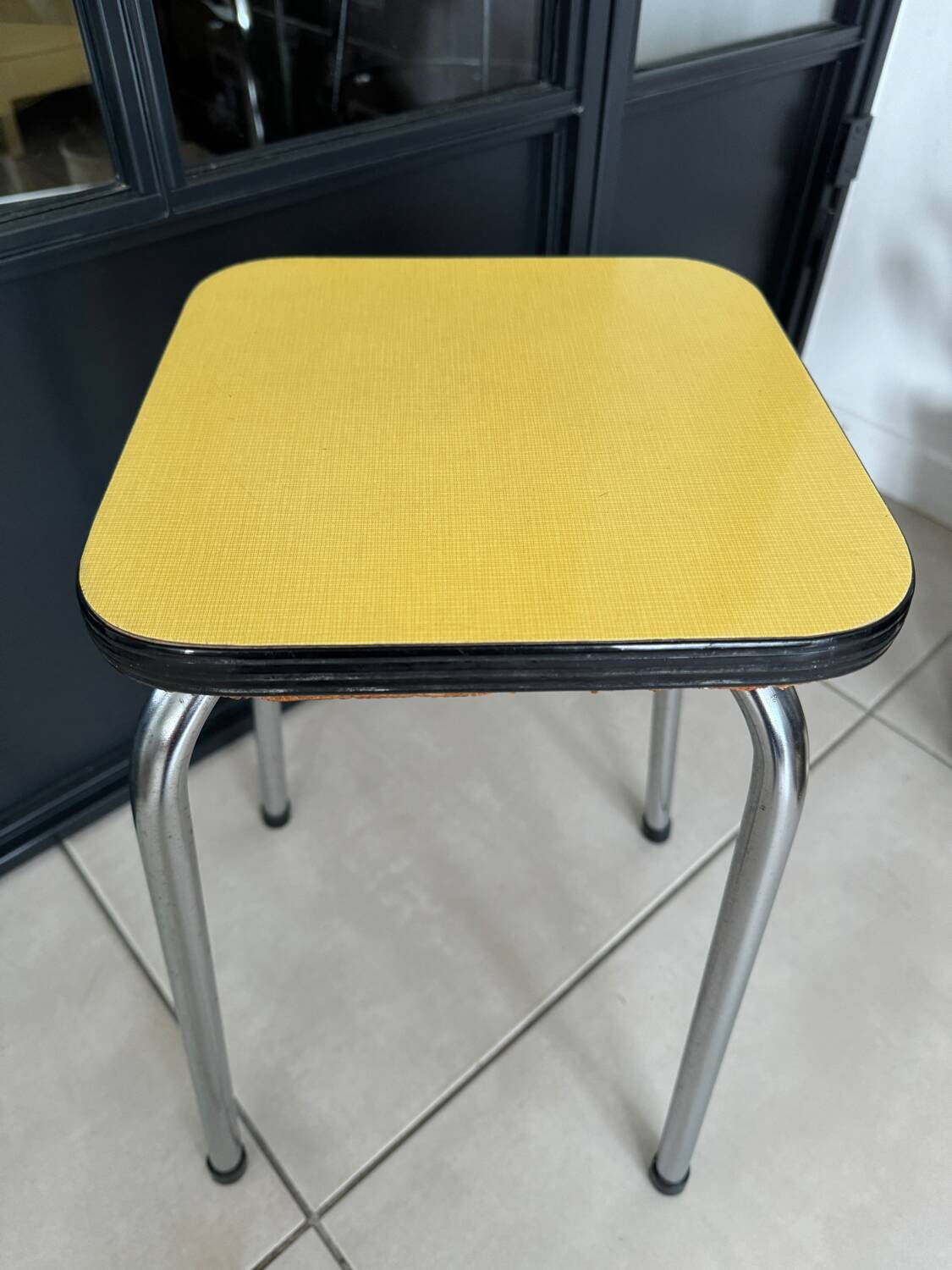 Yellow Formica stool