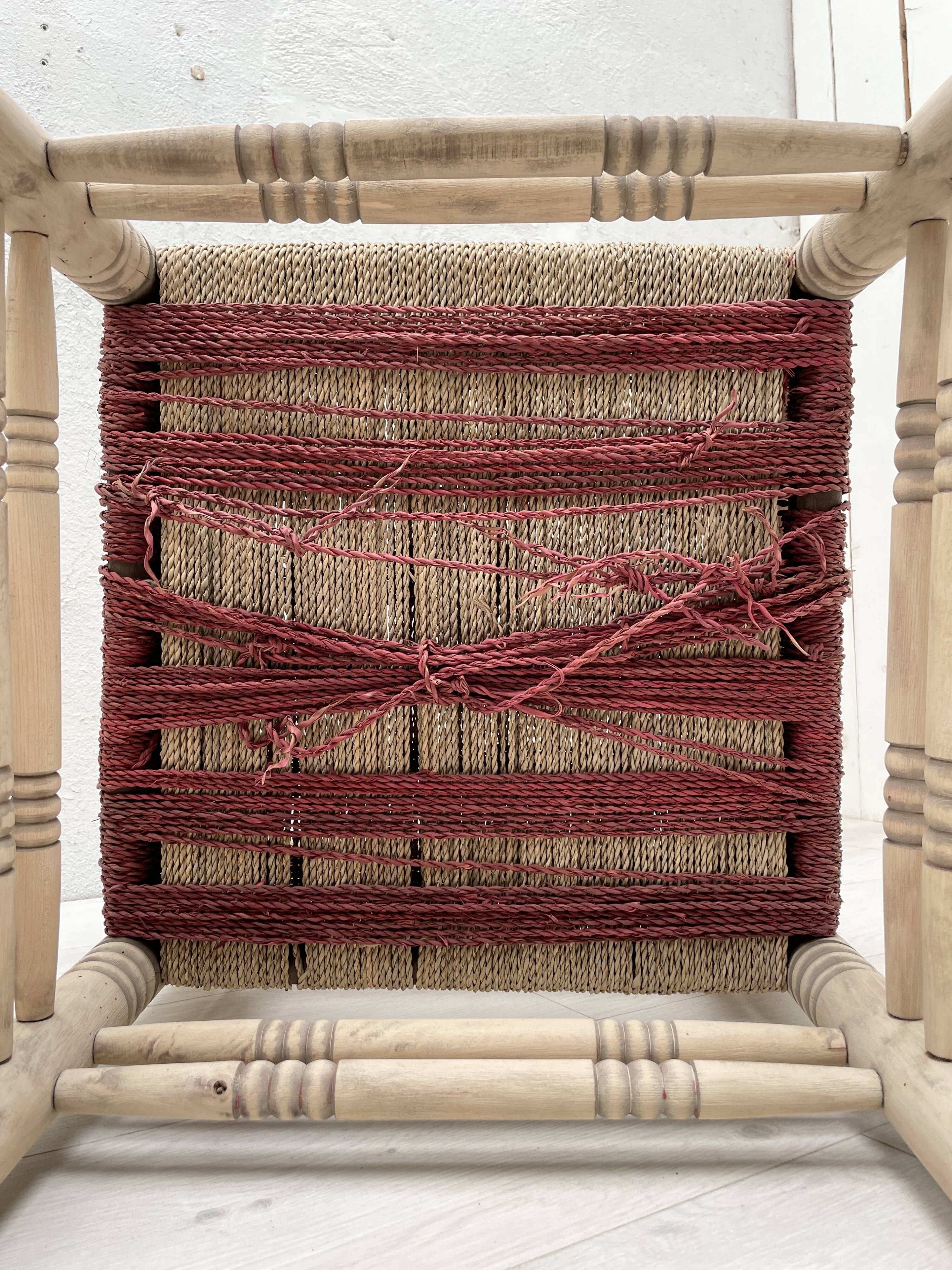 Pair of wooden armchairs and ropes