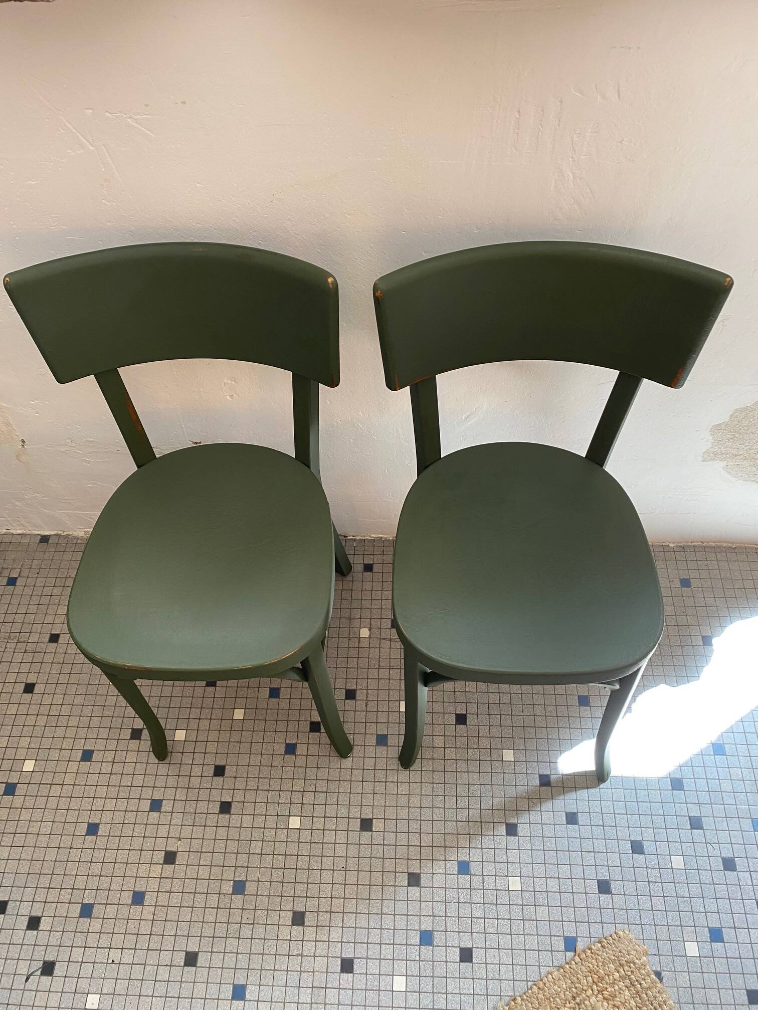 Pair of Baumann bottle green bistro chairs