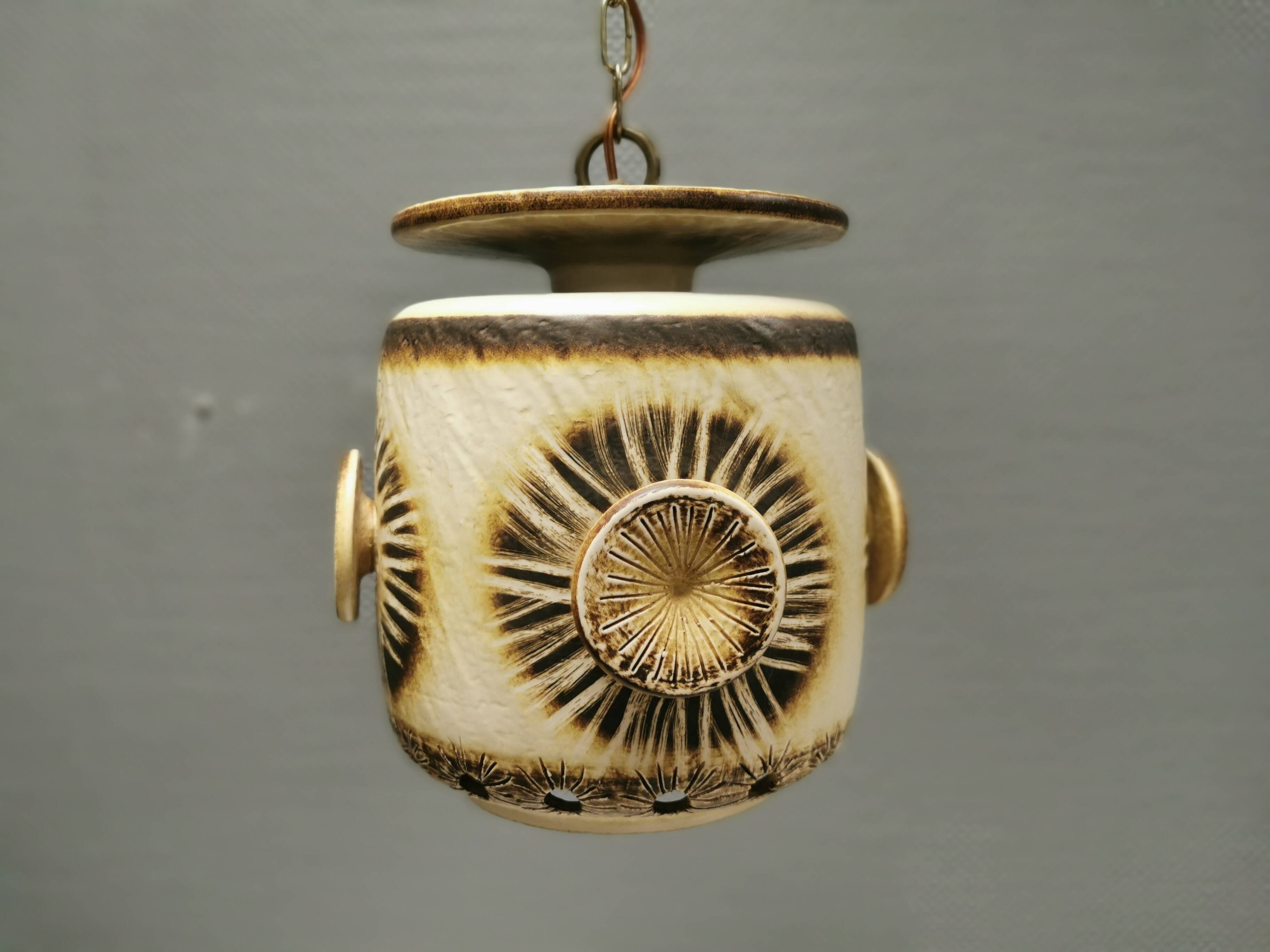 Large and beautiful hanging lamp in ceramic. Danish from the 70s, in super nice condition.