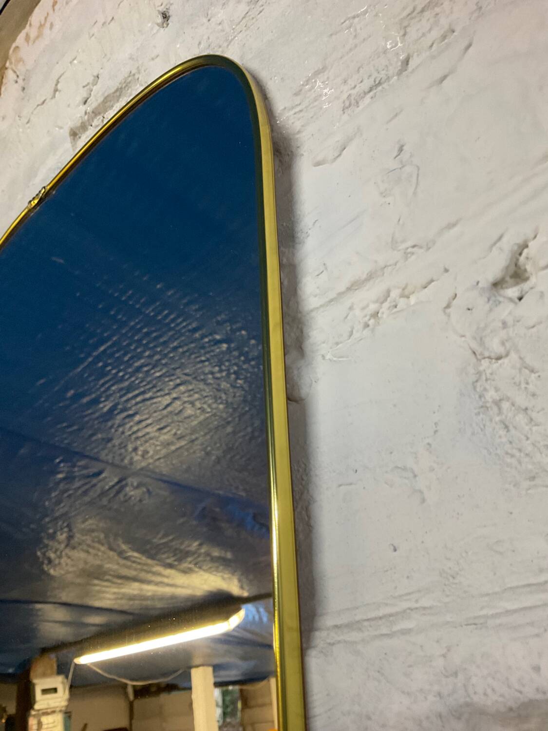 Miroir asymétrique forme libre des années 60