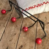 Red and black coat rack