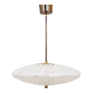 Lustre en laiton, design