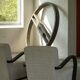 A pair of Swedish Art Deco lounge chairs with curved armrests, 1930s.