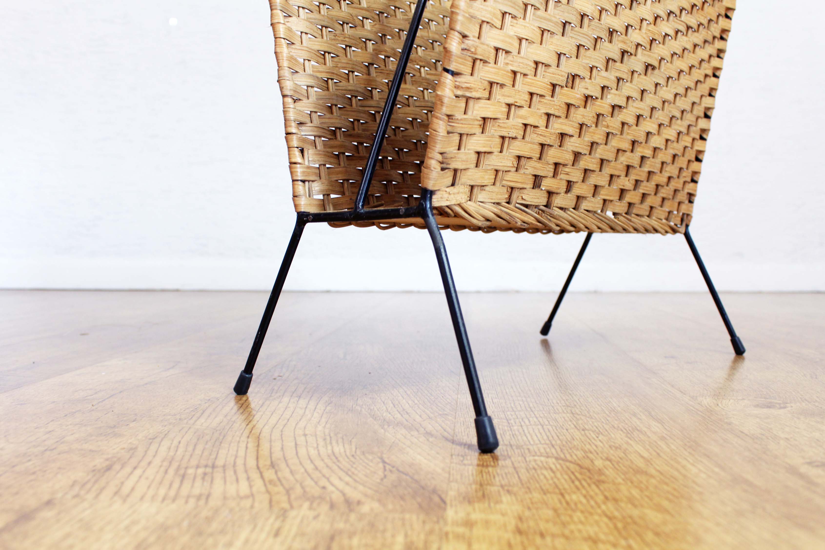 Vintage wicker magazine rack