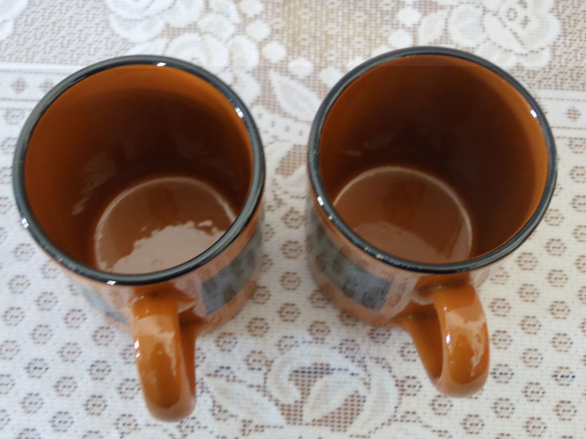 2 glazed terracotta mugs
