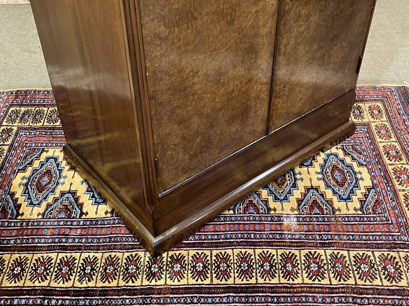 Small English Art Deco student wardrobe in walnut from the 1950s.