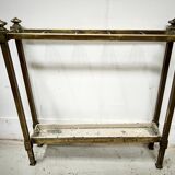 Brass and sheet metal umbrella stands from the 20th century.