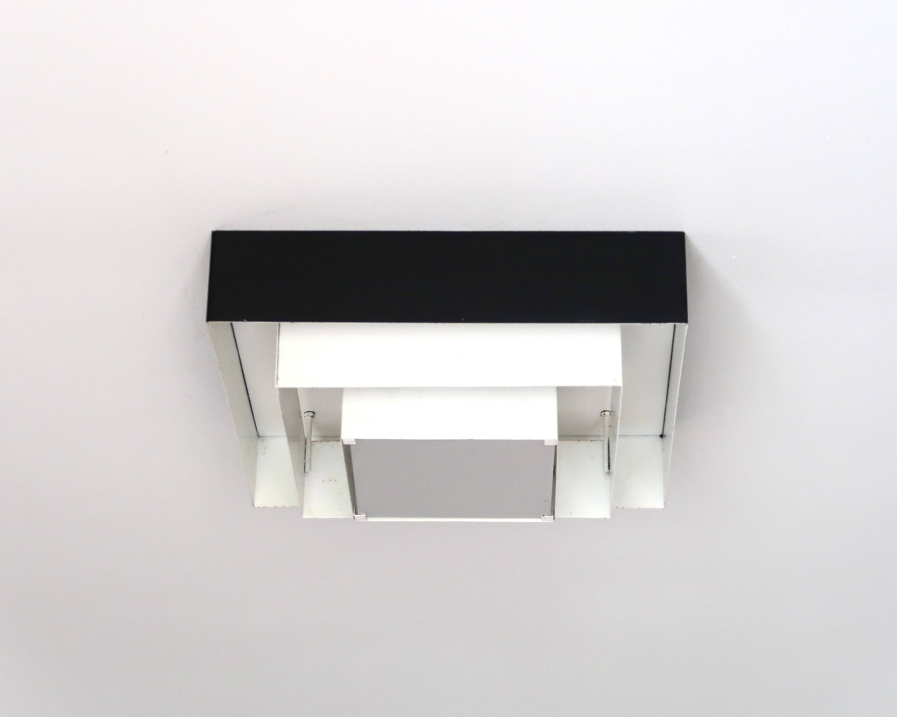 Ziggurat ceiling light Raak Amsterdam in black and white metal, 1960s.