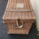 Antique vintage rattan and wicker travel trunk from the 1900s