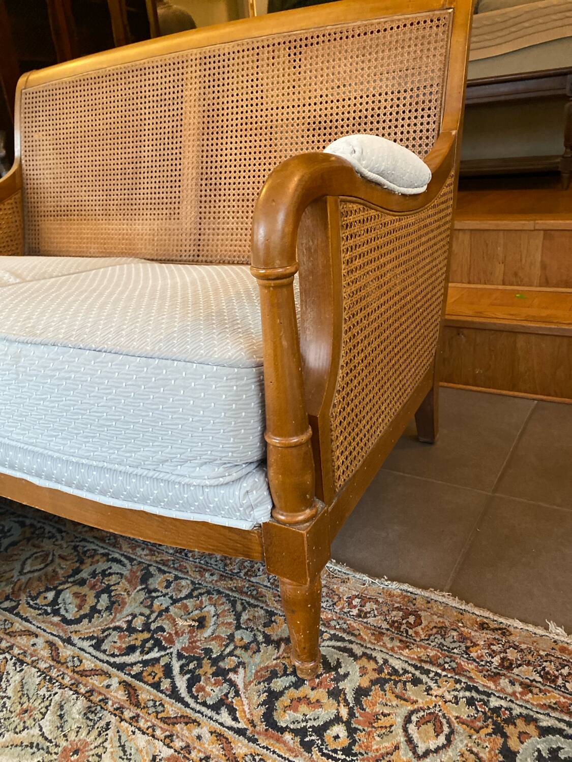 Sofa and armchair in cane and wood by Jean Roche