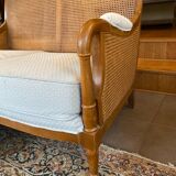 Sofa and armchair in cane and wood by Jean Roche