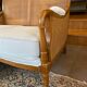 Sofa and armchair in cane and wood by Jean Roche