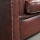 Cowhide Chesterfield armchair in a classic English style