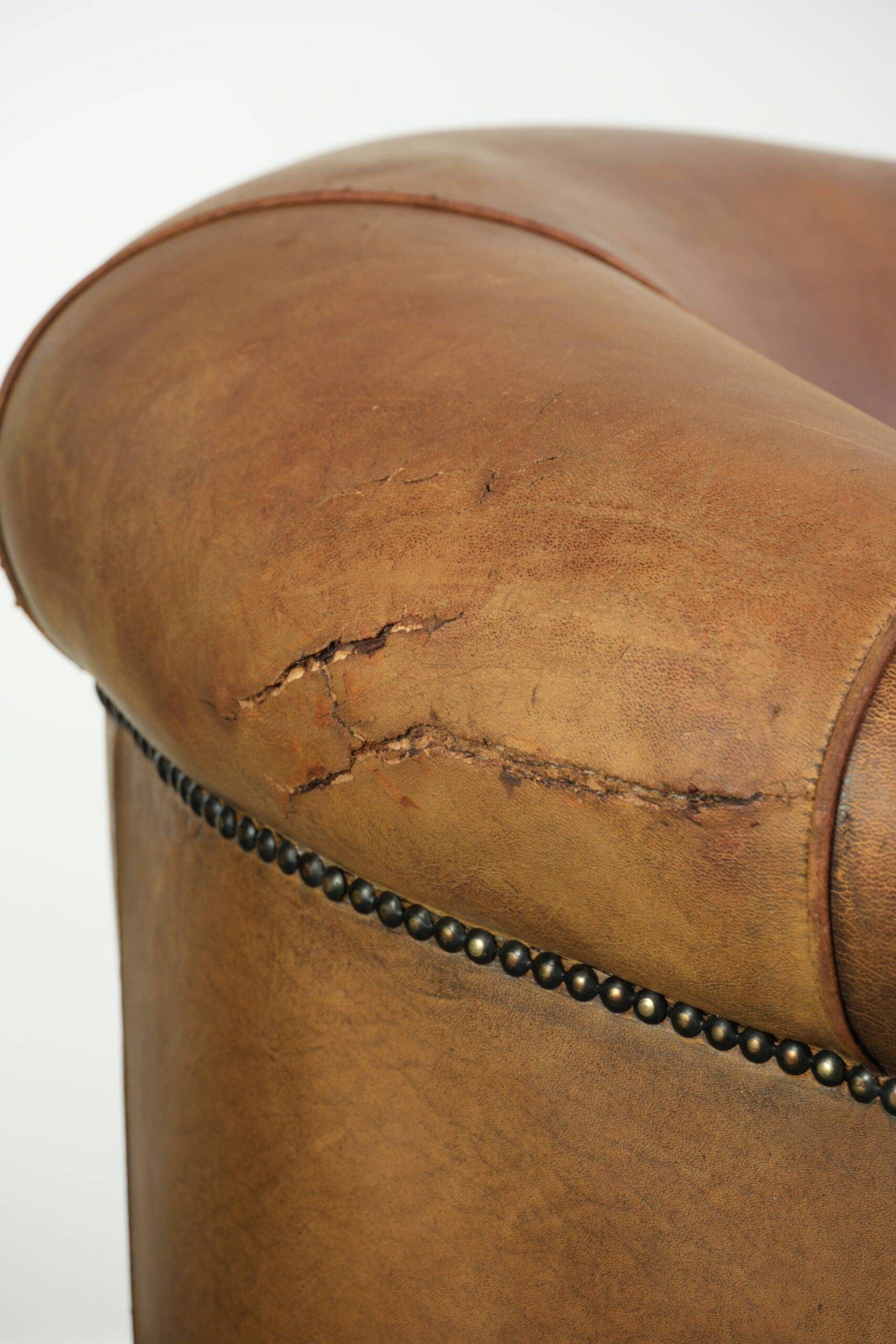 Sturdy set of vintage sheepskin club armchairs with a great appearance