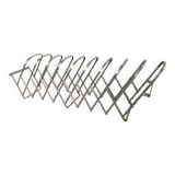 Expandable magazine rack Luther Evans