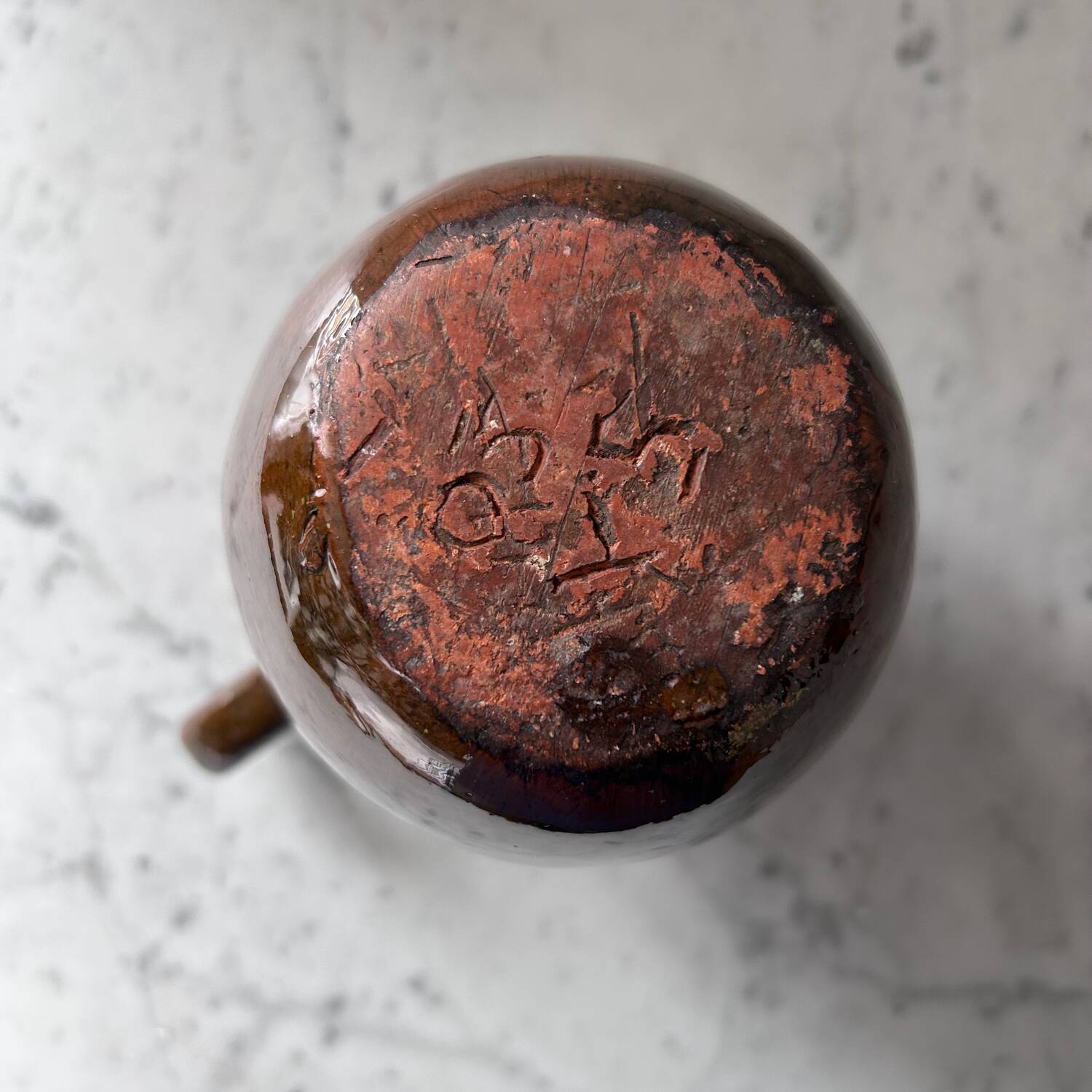 Old signed artisanal pitcher