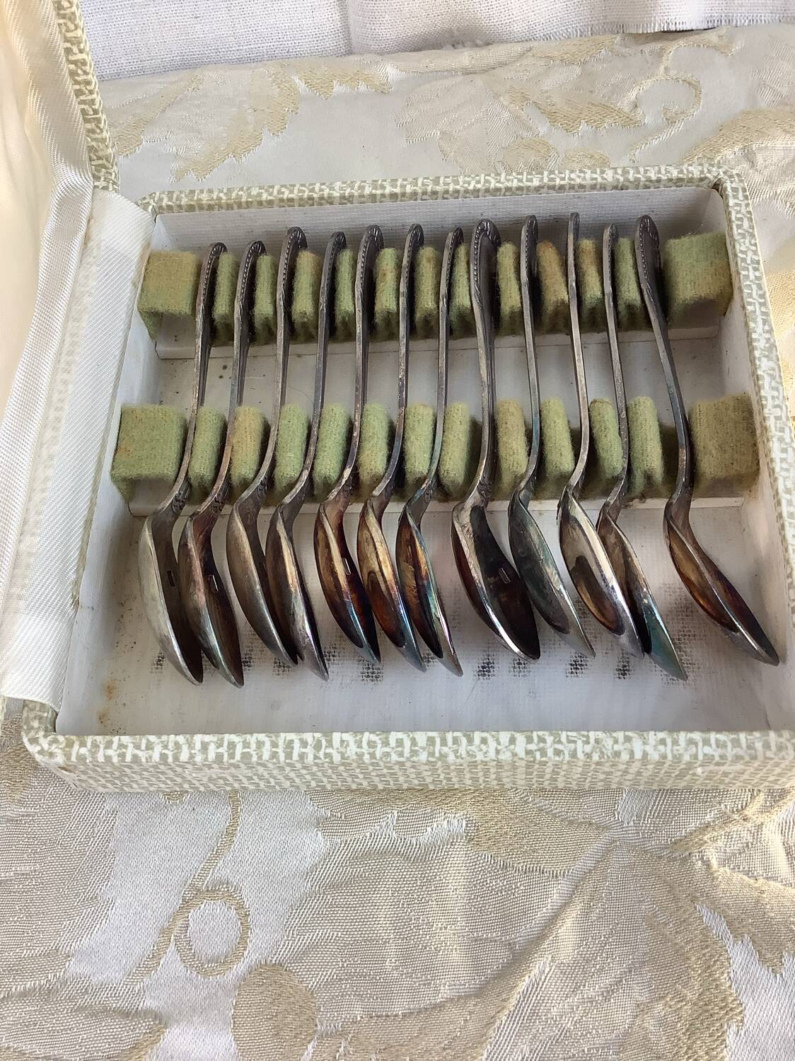 Box of 12 old spoons