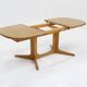 Table à manger ovale extensible vintage danoise en bois massif